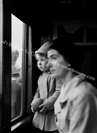 MOTHER AND CHILD AT WINDOW